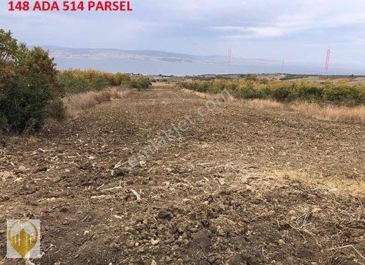 LAPSEKİ SULUCADA MUHTEŞEM KÖPRÜ MANZARALI SATILIK ARAZİ