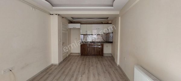  BUCA ATATÜRK MAHALLESİNDE BAHÇE KATI DOĞALGAZLI KORİDORLU 1+1