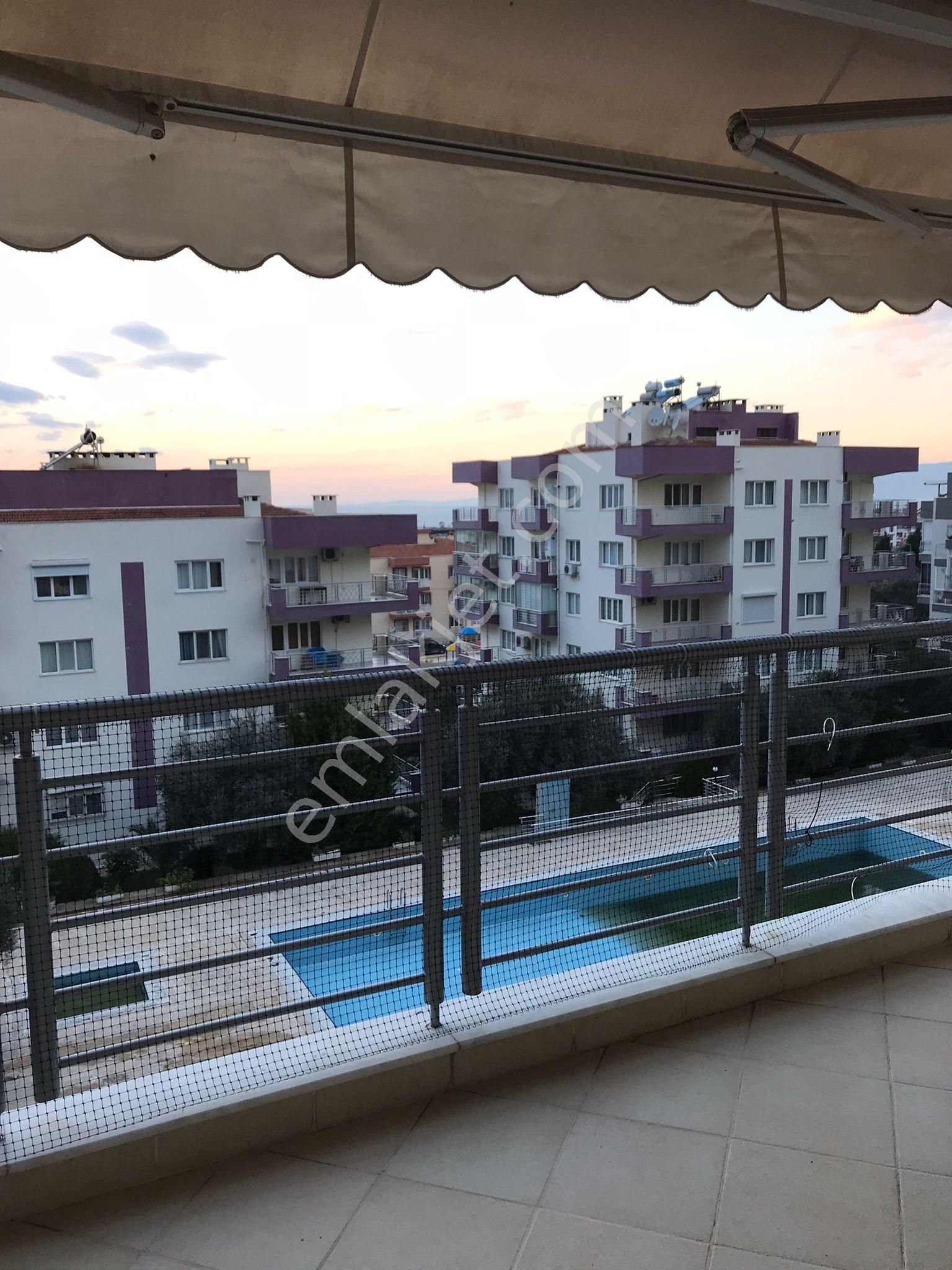 Kuşadası Ege Satılık Daire deniz manzaralı yüzme havuzlu 3+1 135 m2 satılık daire