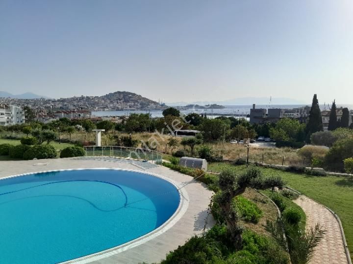 Kuşadası Türkmen Satılık Daire full deniz manzaralı marina da  3+1 bakımlı daire