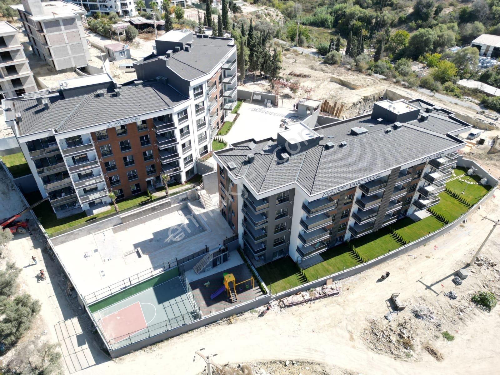 Kuşadası İkiçeşmelik Satılık Residence  MERKEZE YAKIN-7/24 GUVENLIK-HAVUZ-OTOPARK-PEYZAJ-YERDEN ISITMA-ULTRA LÜX-AKILLI EV