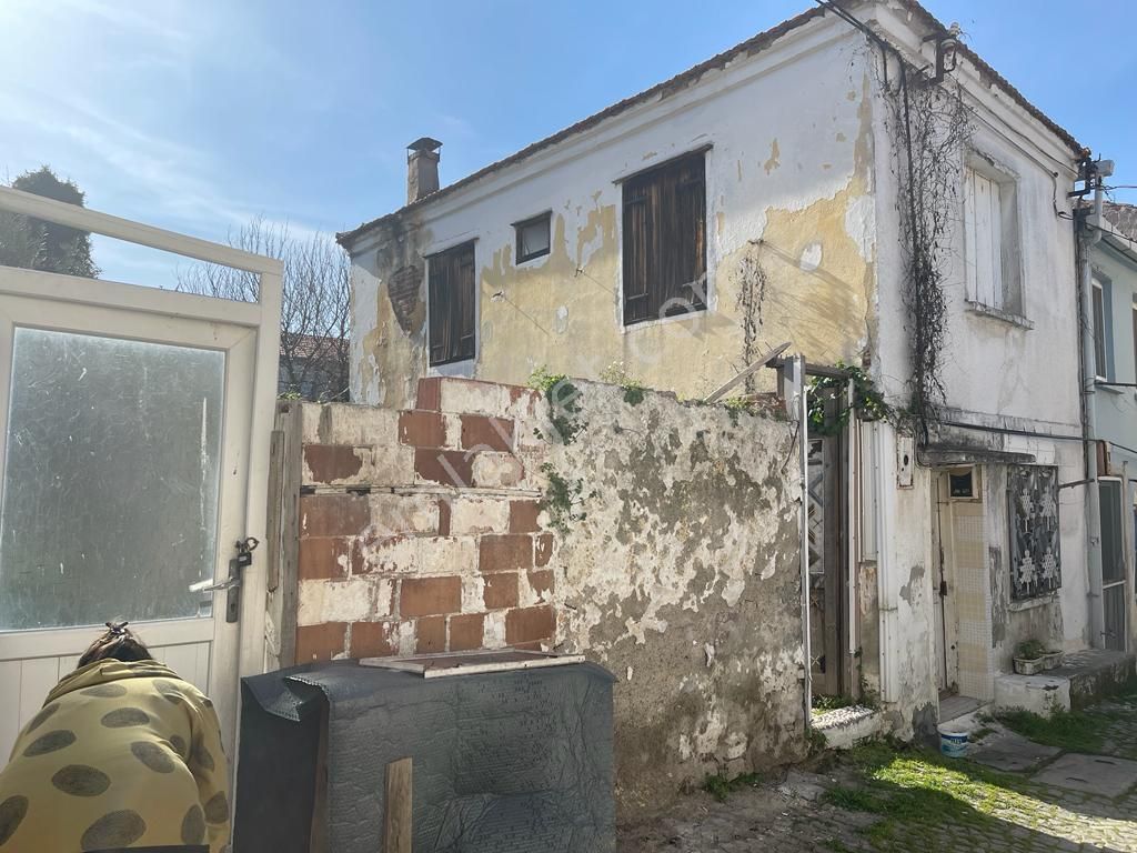 Ayvalık Gazi Kemal Paşa Satılık Müstakil Ev  AYVADA'DAN AYVALIK GAZİ KEMAL PAŞA 2 KATLI TAŞ RUM EVİ VE İMARLI ARSA