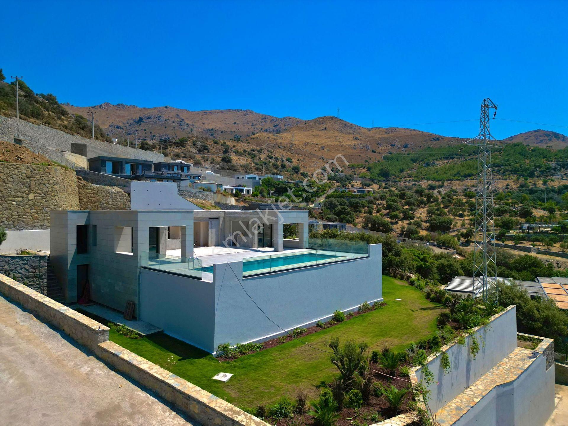 Bodrum Gümüşlük Satılık Villa  Bodrum Gümüşlük’te Satılık 4+1 Deniz Ve Doğa Manzaralı Site İçerisinde Tam Müstakil Villa 