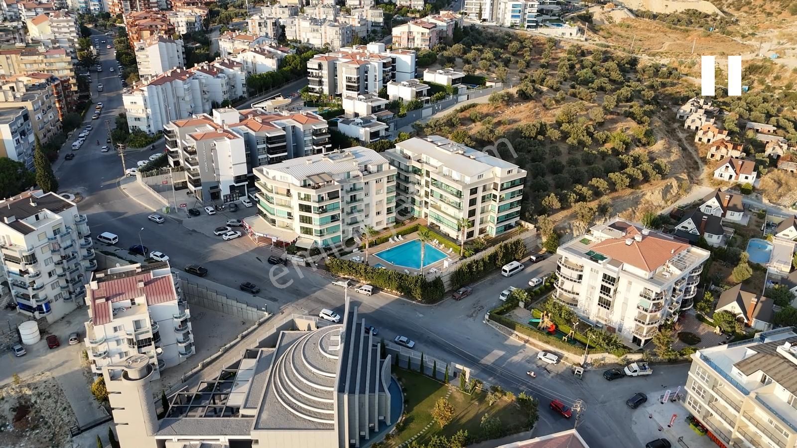 Kuşadası Ege Satılık Daire  KUŞADASINDA EGE MAHALLESİNDE DENİZ VE DOĞA MANZARALI HAVUZLU VE GÜVENLİKLİ ÇATI DUBLEKS