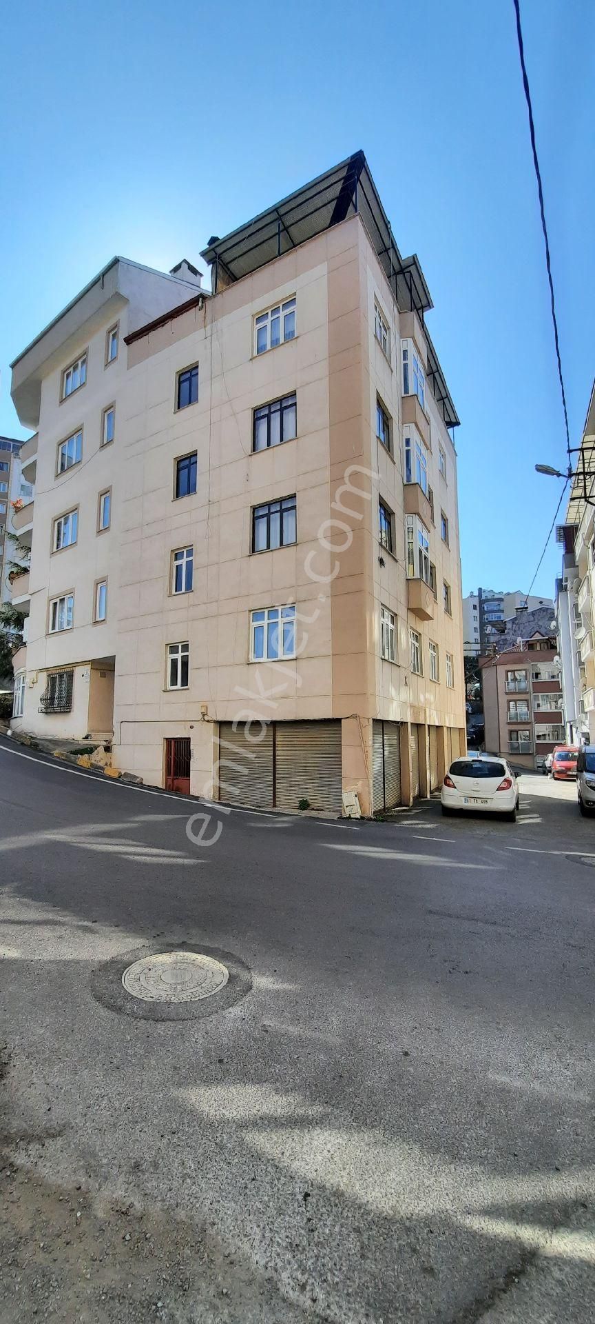 Ortahisar Karşıyaka Satılık Daire karşıyakada satılık 4.5 katlı 2+1  bina