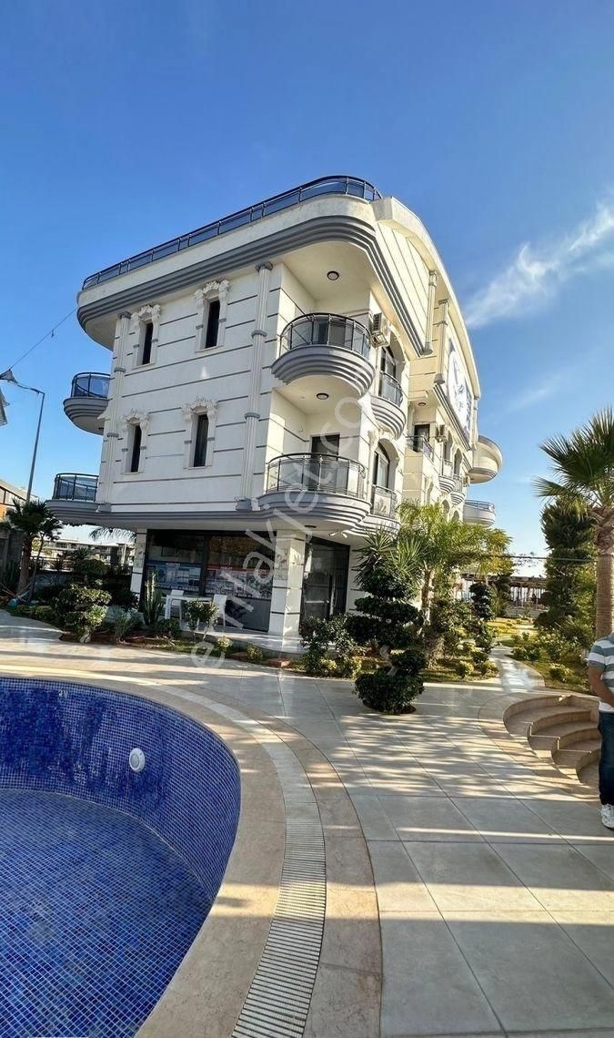 Didim Altınkum Satılık Daire Didimde Satılık Altınkumda Deniz Manzaralı Eşyalı Havuzlu Site İçinde 1+1 Daire