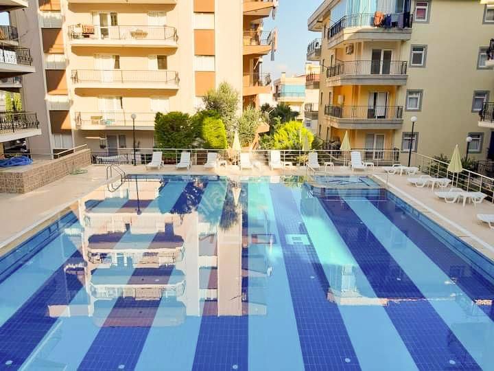 Kuşadası Ege Satılık Daire  EGE MAHALLESİNDE ELİT HAVUZLU SİTEDE DENİZ MANZARALI 3+1 DAİRE