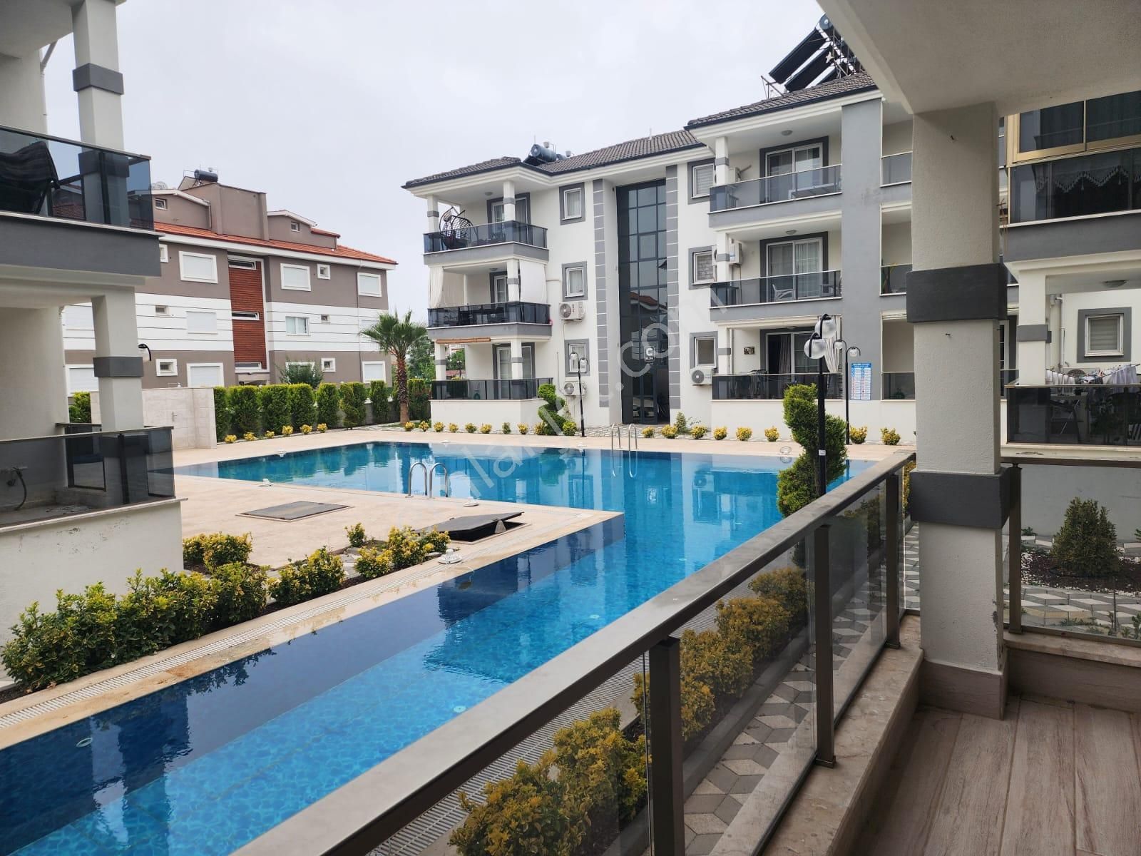 Dalaman Söğütlüyurt Satılık Daire  SÖĞÜRLÜYURT'ta 2+1 95 m² HAVUZLU EŞYALI DAİRE