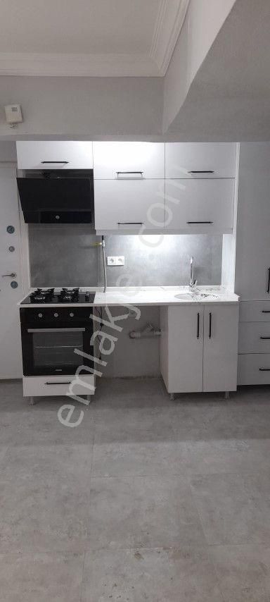 Bornova Kızılay Satılık Daire  BORNOVA KIZILAY MAHALLESİNDE 2+1 TADİLATLI SATILIK DAİRE