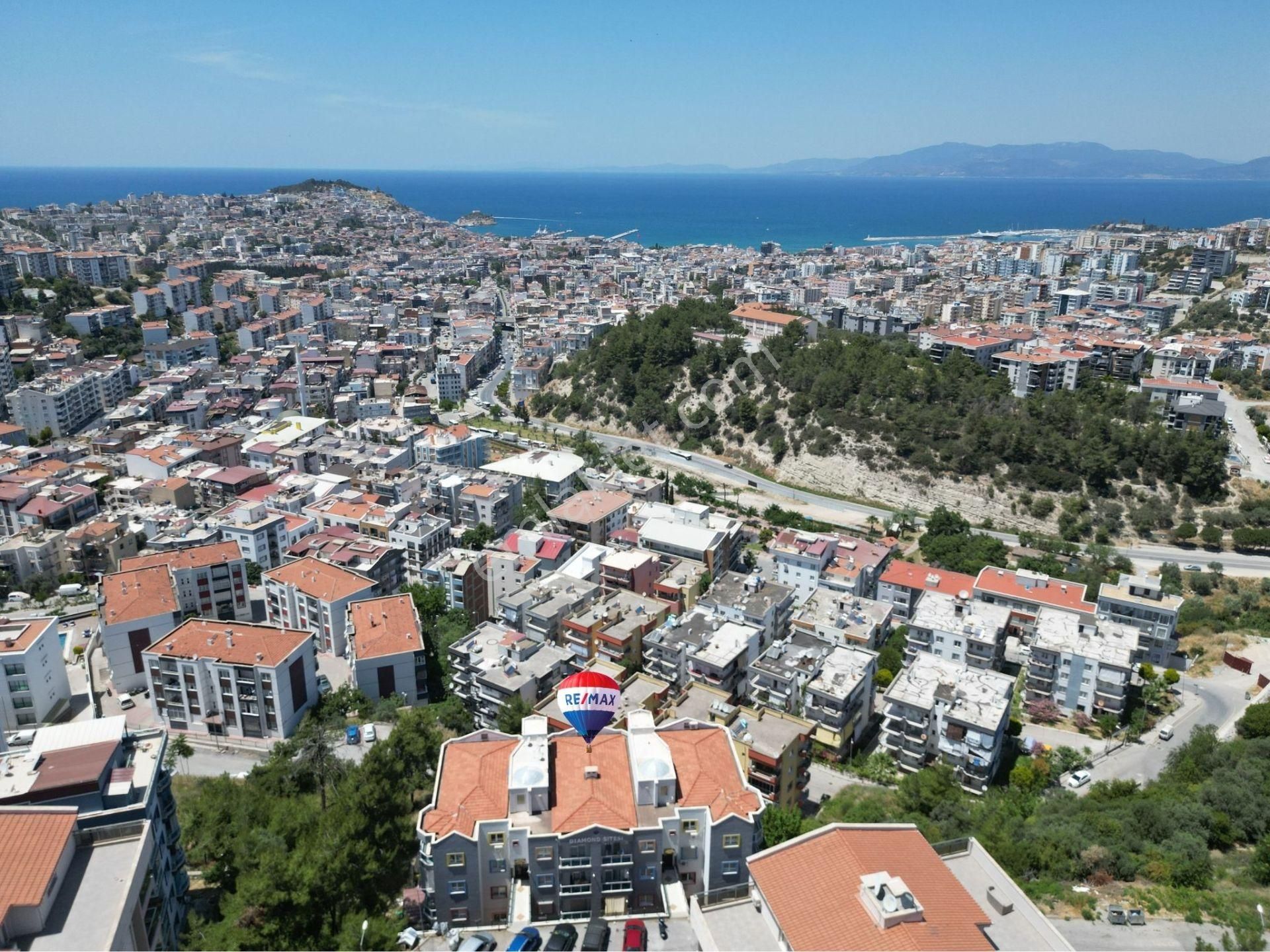 Kuşadası İkiçeşmelik Satılık Daire  KUŞADASI İKİÇEŞMELİK'TE SATILIK DENİZ MANZARALI 2+1 DAİRE