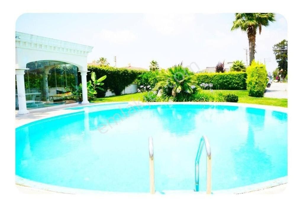 Narlıdere Sahilevleri Kiralık Villa  Sahilevlerinde  2500 m²   içinde  müstemilat & havuzlu 5+3 malikane
