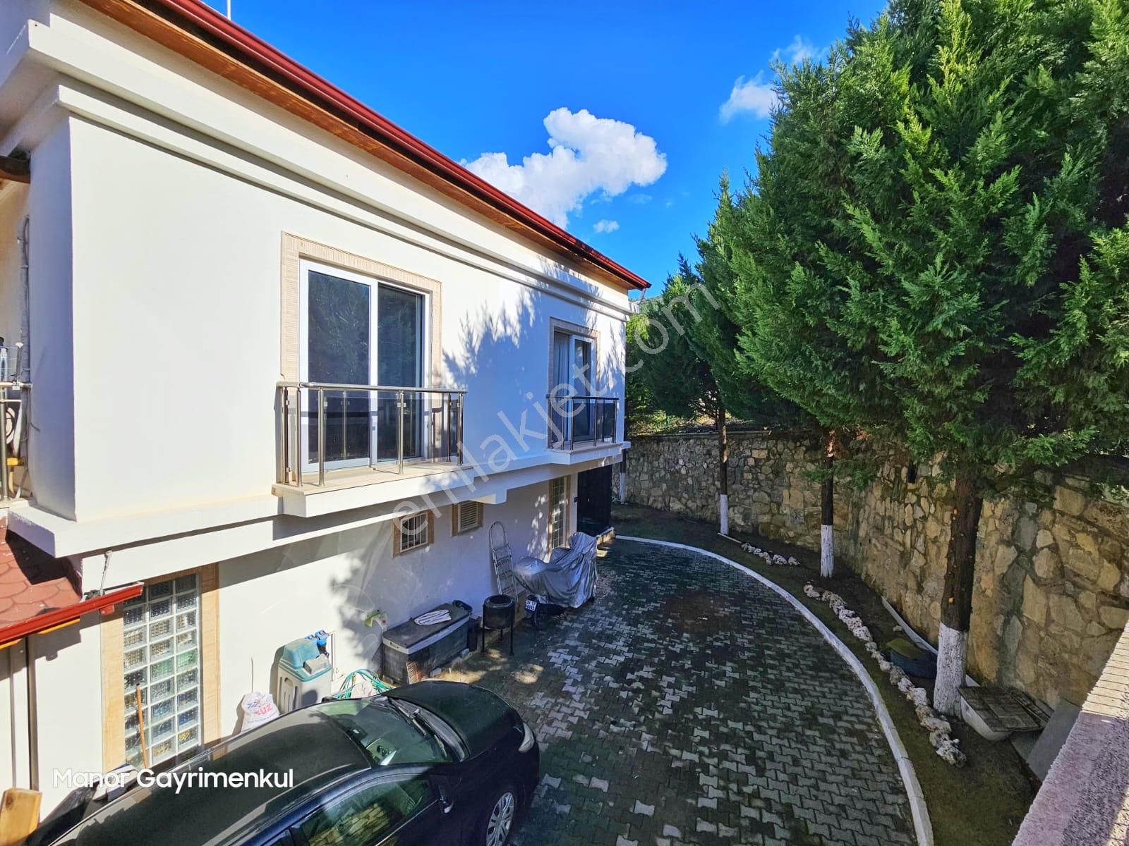 Kuşadası Bayraklıdede Satılık Villa  MANOR'DAN KUŞADASI BAYRAKLIDEDE DE HAVUZLU SİTEDE BAHÇELİ VİLLA