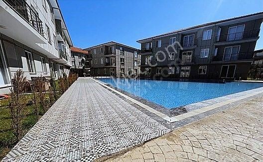 Karasu Yalı Satılık Daire  HAVUZLU SIFIR ARA KAT ÖN CEPHE KÖŞE MODEL TAM BİR FIRSAT DAİRE