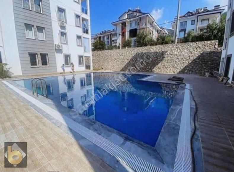 Fethiye Pazaryeri Satılık Daire FETHIYE PAZARYERİ MAHALLEDE SATILIK HAVUZLU SİTEDE DAİRE