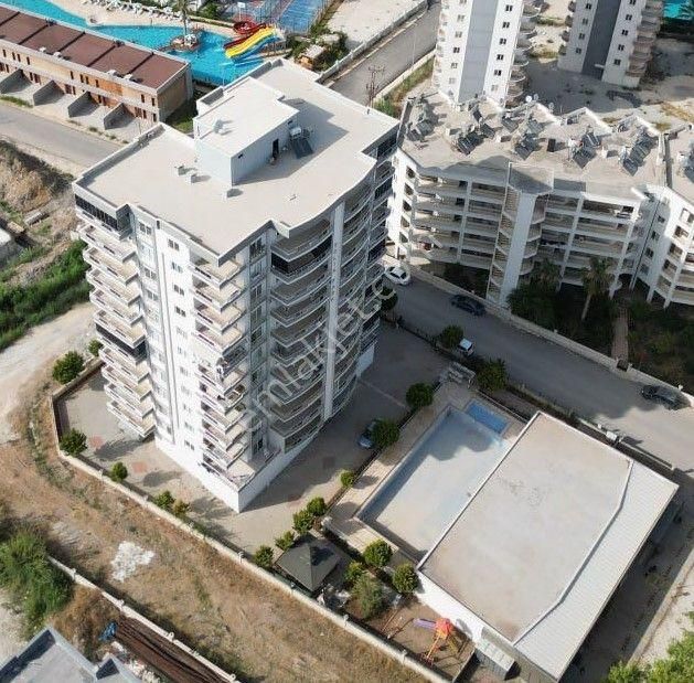 Erdemli Arpaçbahşiş Satılık Daire  KİNG'DEN 250 M DENİZ MESAFE FULL EŞYALI HAVUZLU  2+1 DAİRE