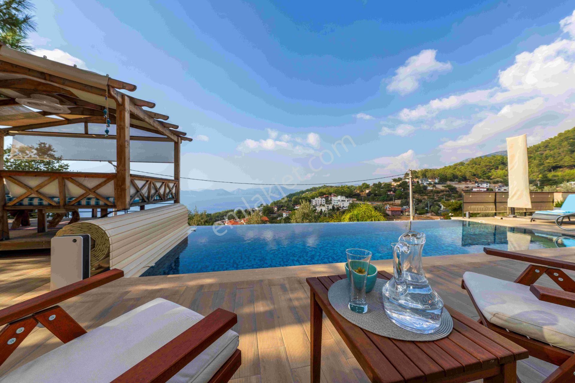 Fethiye Faralya Satılık Villa Faralya'da Kapanmayan Panoramik Deniz Manzaralı Benzersiz Taş Villa