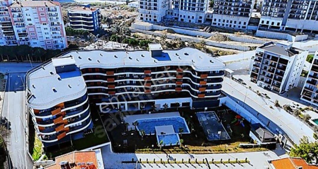 Kuşadası İkiçeşmelik Satılık Daire  KUŞADASI MERKEZDE HAVUZLU SİTEDE SATILIK 3+1 DAİRE