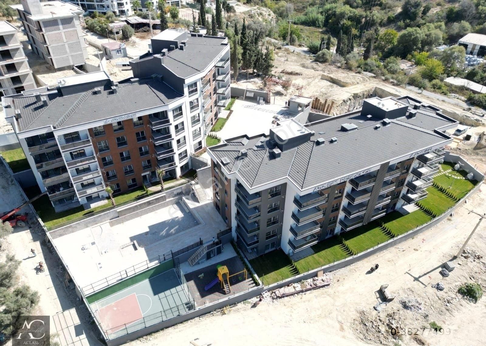 Kuşadası İkiçeşmelik Satılık Residence MERKEZE YAKIN-7/24 GUVENLIK-HAVUZ-OTOPARK-PEYZAJ-YERDEN ISITMA-ULTRA LÜX-AKILLI EV