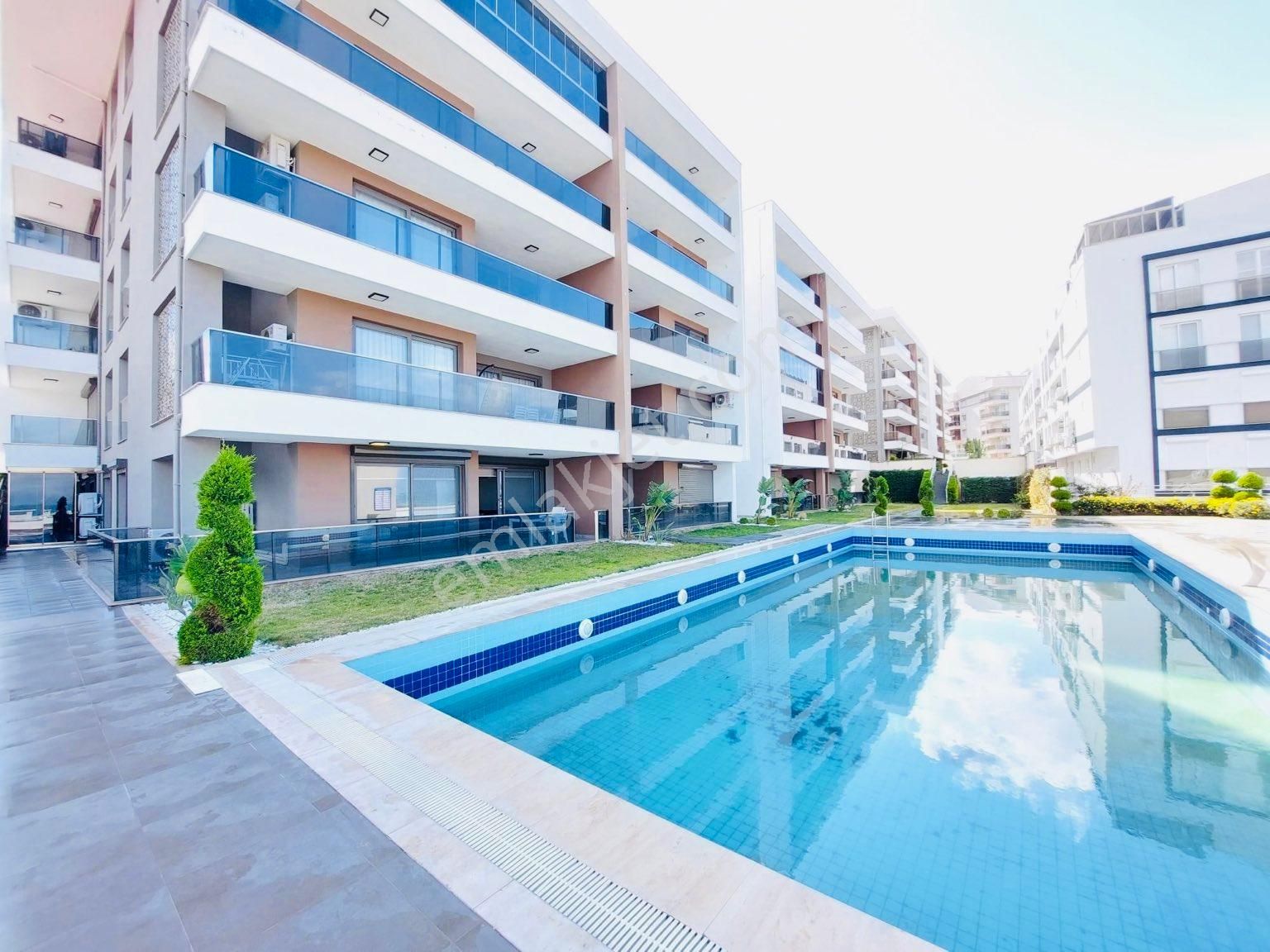 Kuşadası İkiçeşmelik Satılık Daire FULL DENİZ MANZARALI AÇIK KAPALI HAVUZ SAUNA 3+1 SIFIR ARAKAT DAİRE