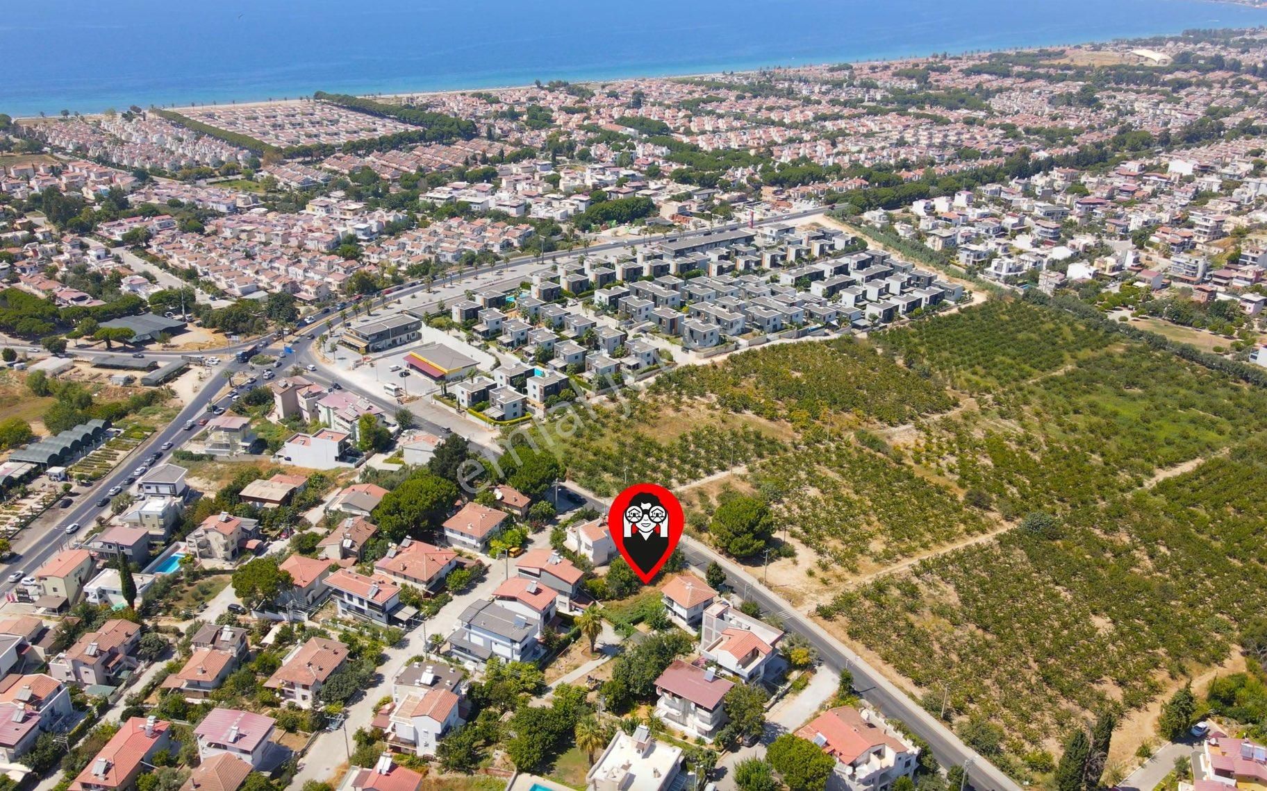 Kuşadası Soğucak Satılık Konut İmarlı Kuşadası Soğucak girişinde yola sıfır kısmi deniz full doğa manzaralı arsa