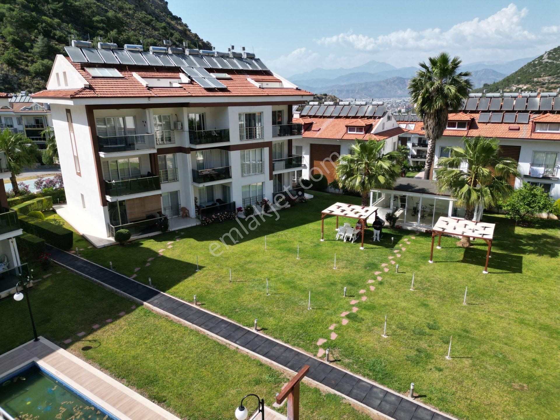 Fethiye Patlangıç Satılık Daire  GoldHouse dan satılık Havuzlu Sitede 1+1 Bahçe Katı  Eşyalı Daire