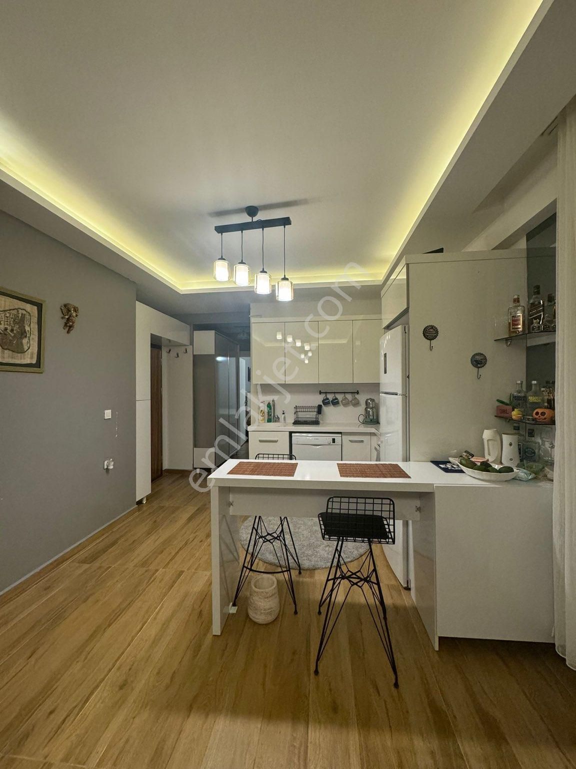 Kuşadasında Havuzlu Güvenlikli Sitede Satılık 1+1 Daire - Görsel 9