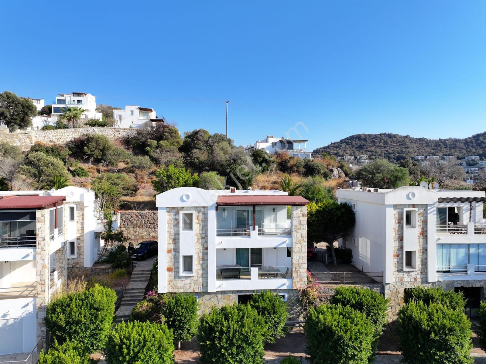 Bodrum Gümüşlük Satılık Daire  Gümüşlükte Satılık Site İçinde Deniz Manzaralı 2+1 Üst Kat Daire