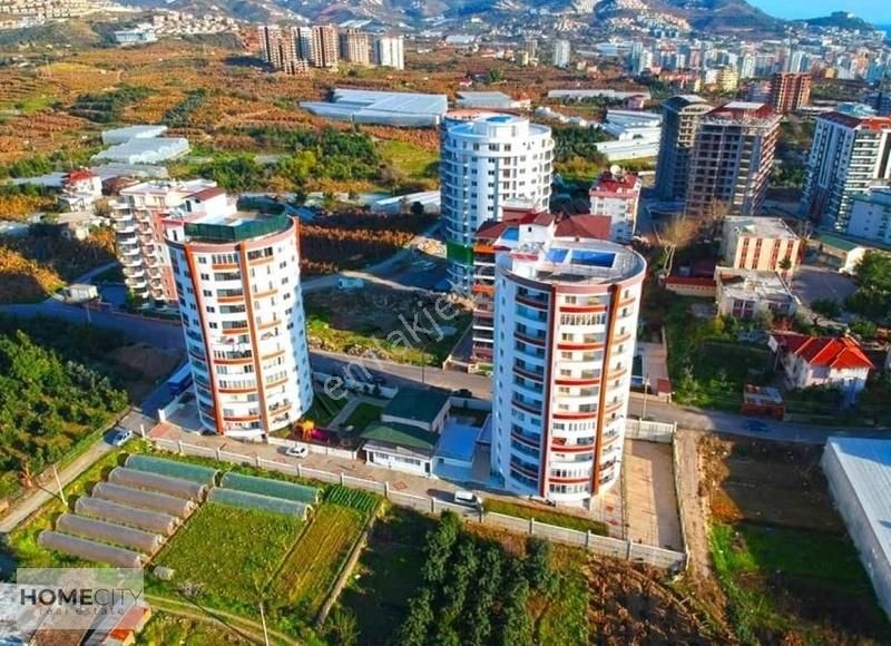 Alanya Mahmutlar Satılık Daire ALANYA MAHMUTLAR 1+1 60M2 DAĞ MANZARALI,EŞYALI,ÖNÜ AÇIK,OTOPARKK