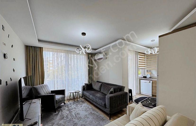 Konyaaltı Liman Satılık Daire  LİMANDA K.OTOPARKLI Y.HAVUZLU ŞIK 2+1 DAİRE