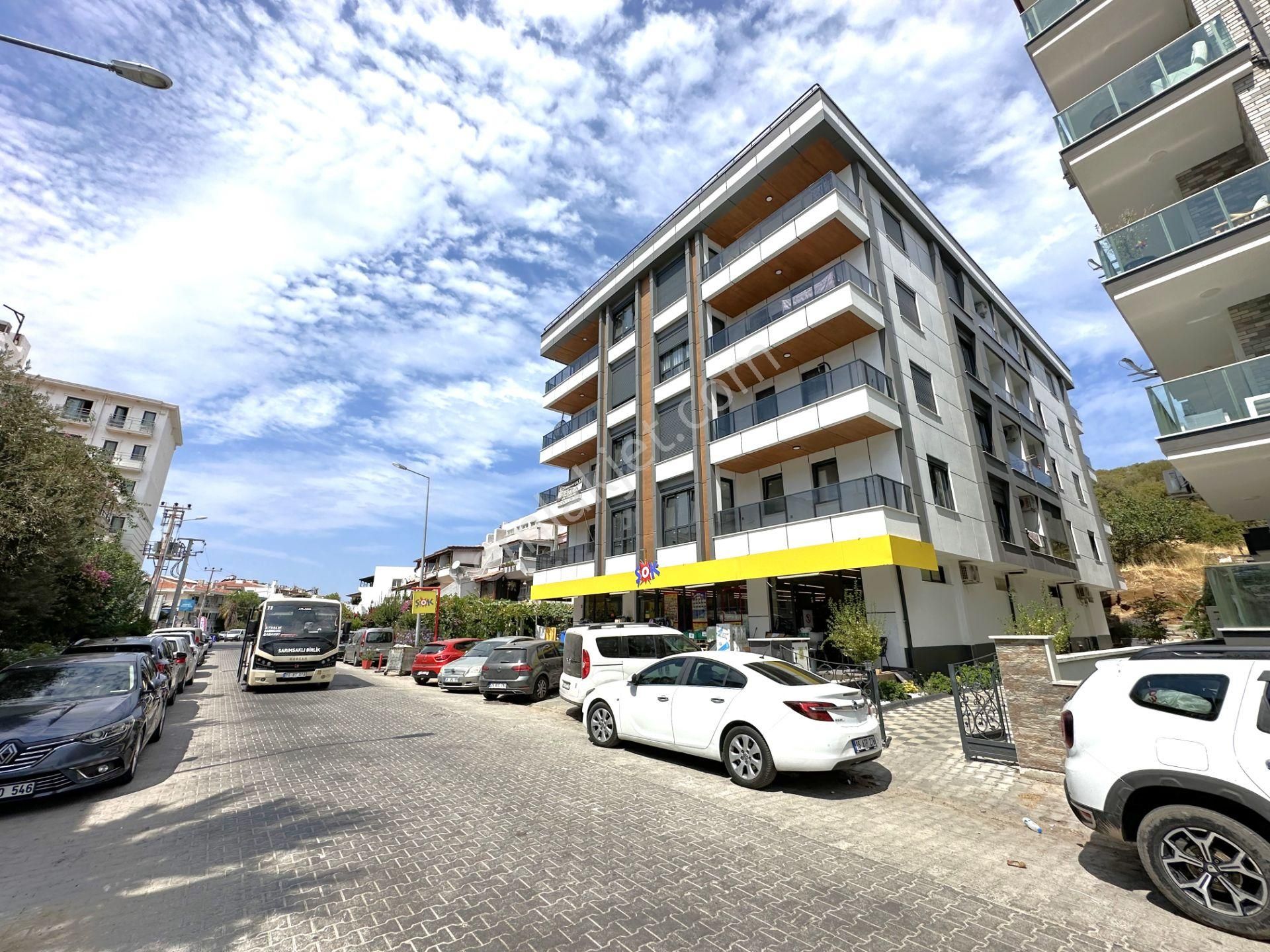 Ayvalık Küçükköy Satılık Daire  SARIMSAKLIDA KUMSALA 150 METRE MESAFEDE SIFIR 1+1 SATILIK DAİRE