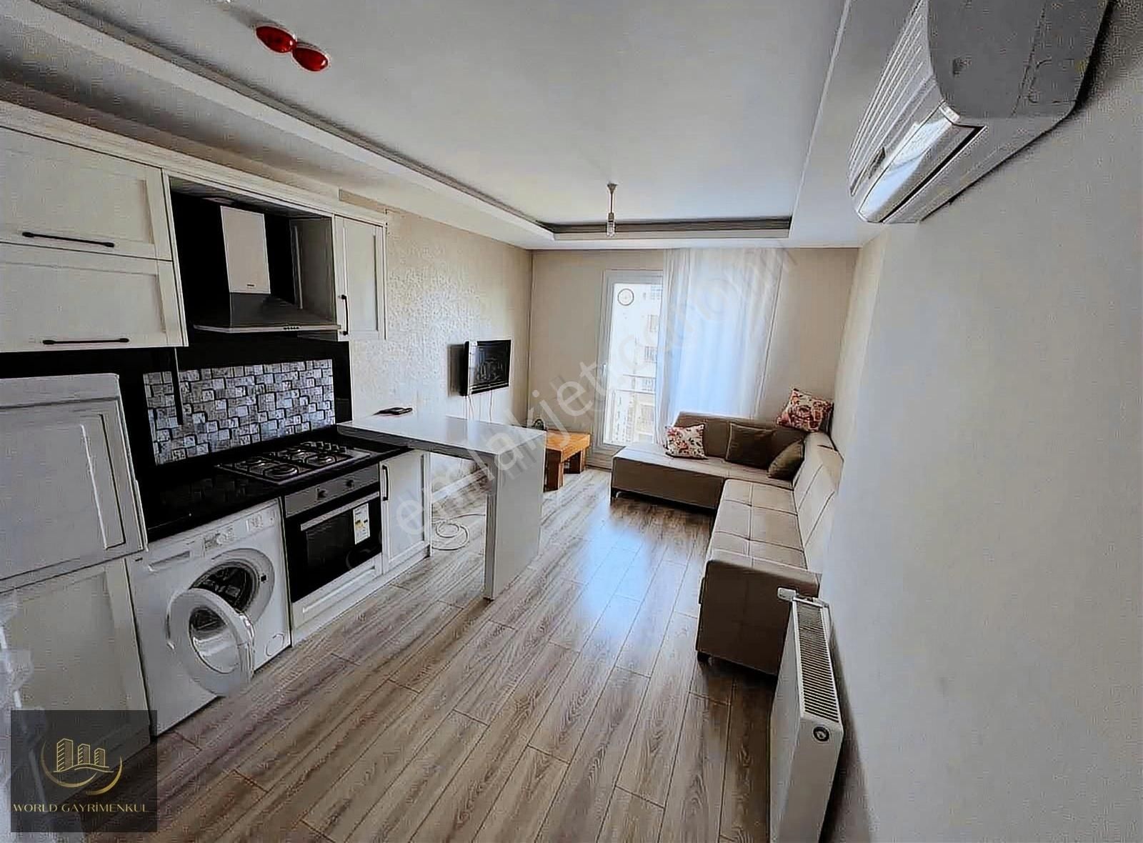 Yenişehir Çiftlikköy Kiralık Daire WORLD GAYRİMENKUL DEN CADDE HAVUZLU 1+1 EŞYALI