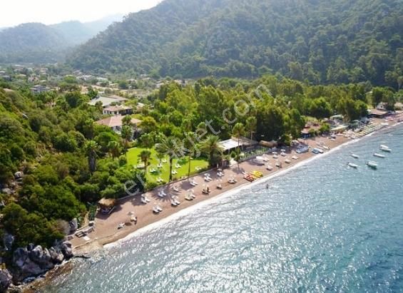 Marmaris Hisarönü Satılık Konut+Ticaret Alanı Hisarönü Plaj Yoluna Cephe Taş Duvarlı 1950 M2 Emsalsiz Arazi