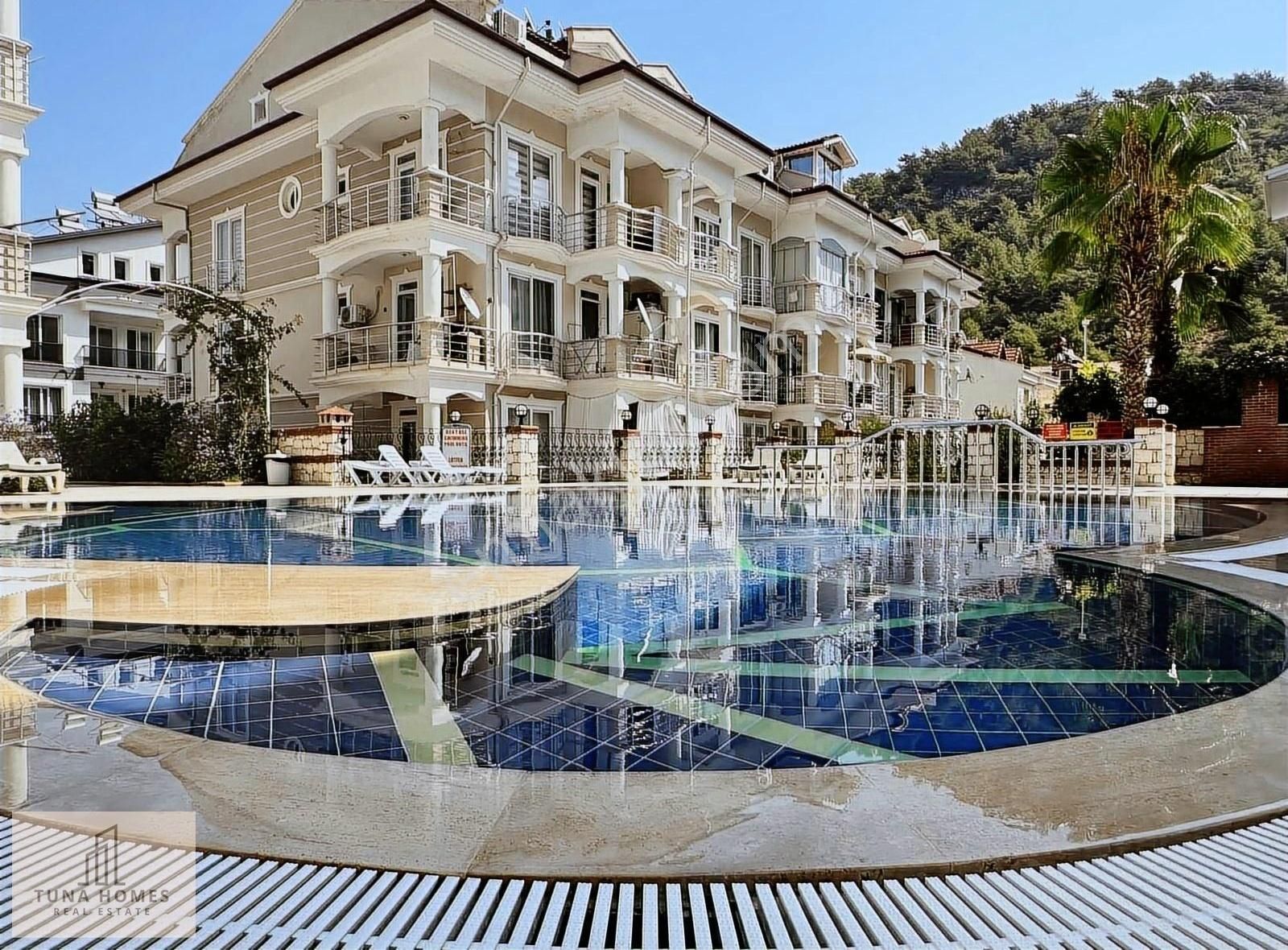 Fethiye Taşyaka Satılık Daire TUNA HOMES'DAN TAŞYAKA MH. EŞYALI SATILIK HAVUZLU 1+1 ARA KAT