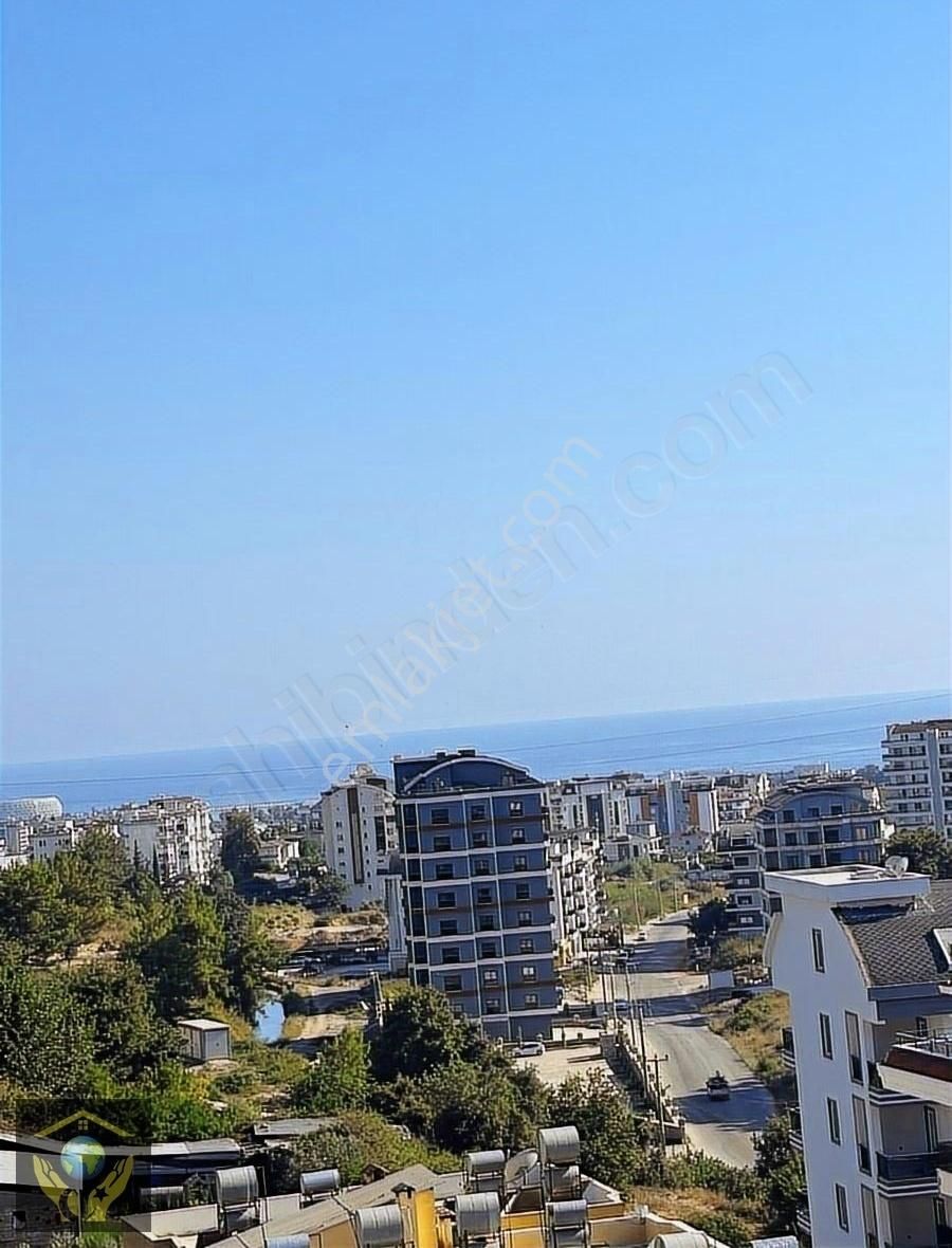 Alanya Avsallar Satılık Daire KUPON FIRSAT DENIZ MANZARALI MERKEZI KONUMDA YATIRIMLIK 1+1