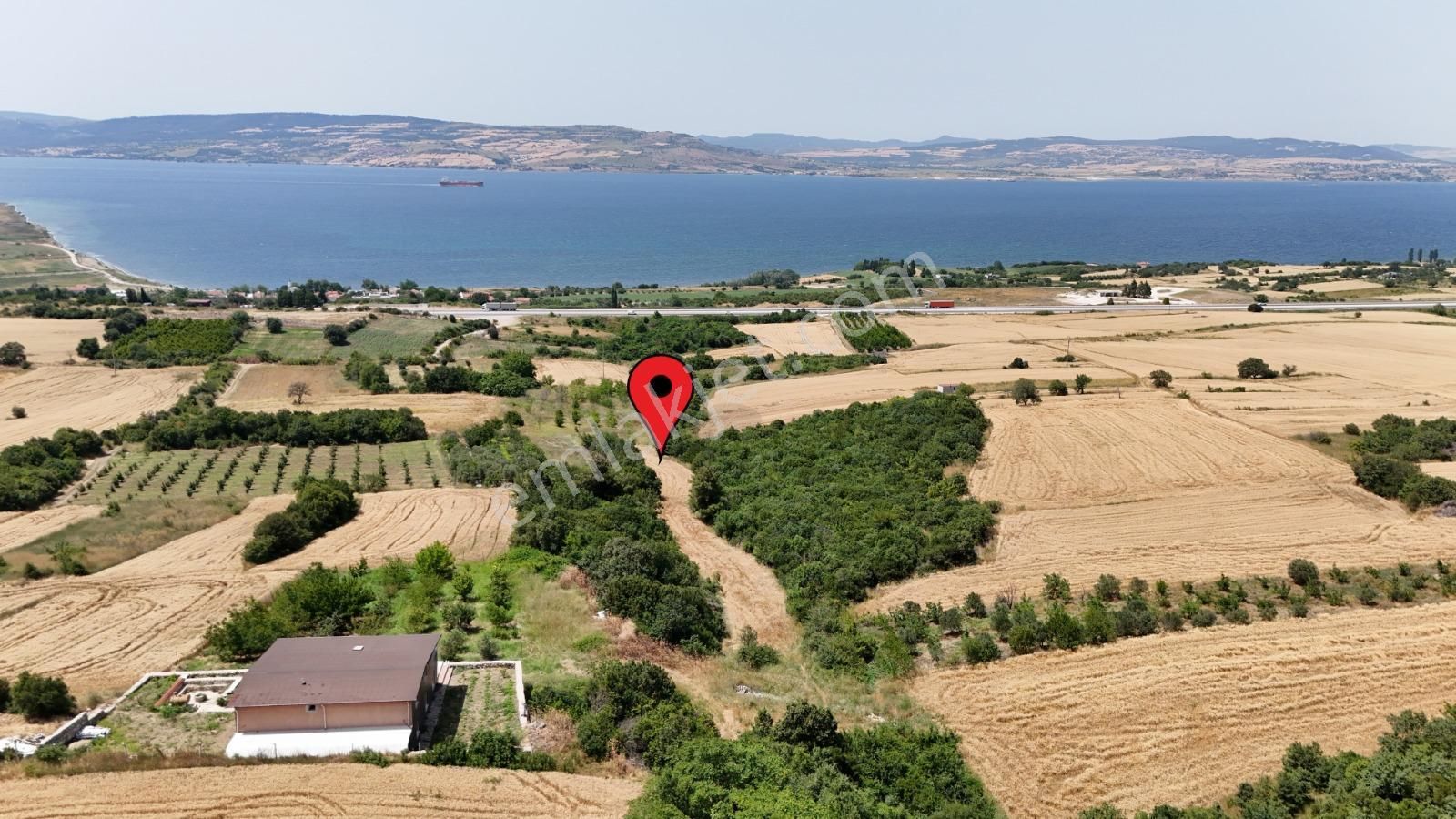 Lapseki Suluca Köyü Satılık Tarla  ÇANAKKALE LAPSEKİ SULUCA'DA BOĞAZ MANZARALI SATILIK TARLA