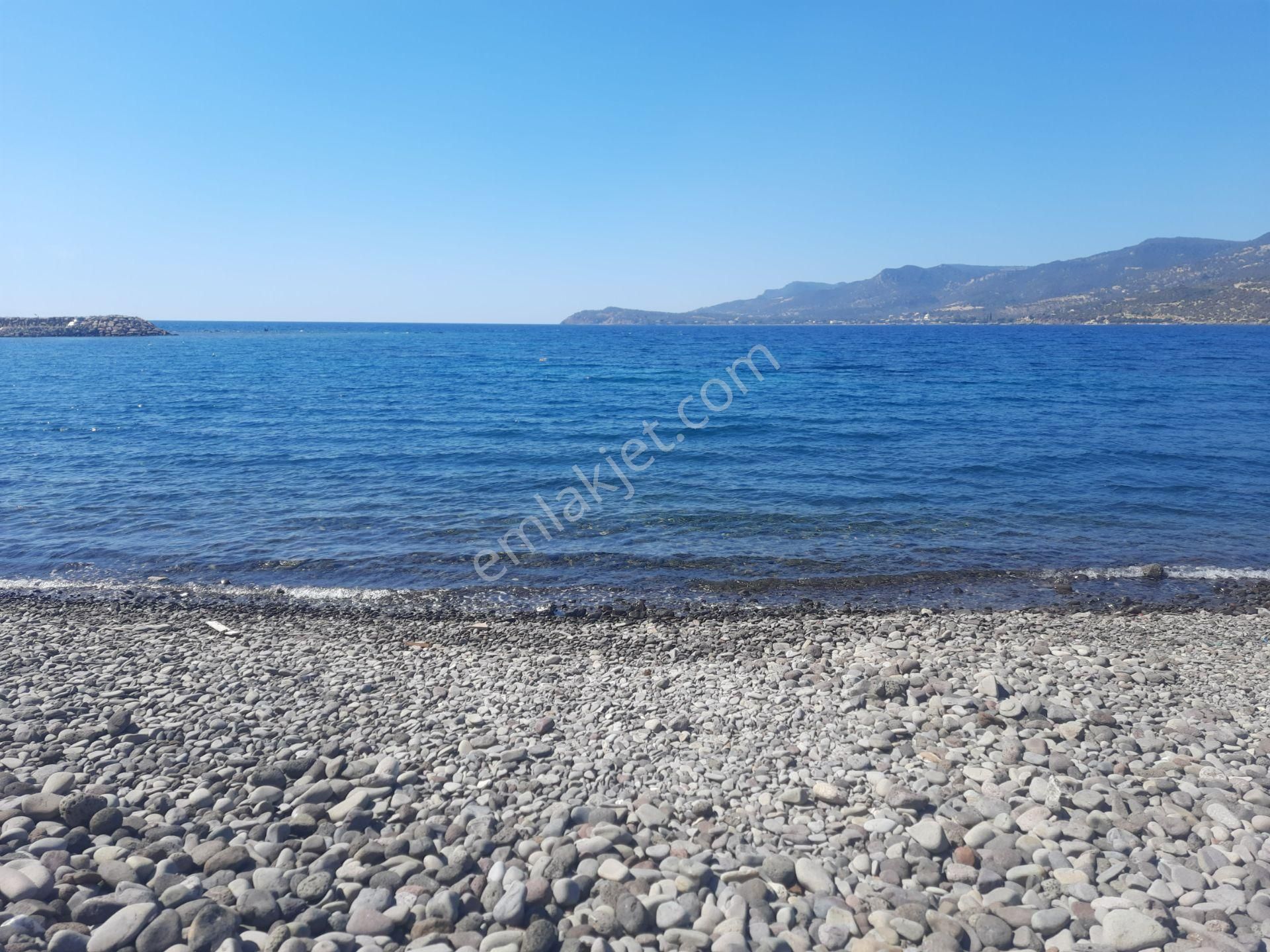 Ayvacık Balabanlı Köyü (Kıran Üstü) Satılık Turizm/Konut Alanı Remax Maviden Assos'da Denize Çok Yakın Turizm İmarlı 1000m²arsa