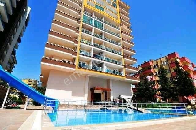 Alanya Mahmutlar Kiralık Daire  1232- ACİL! MAHMUTLARDA ATATÜRK CADDESİNDE 1+0 AİDAT İÇİNDE KİRALIK DAİRE 11,000 TL