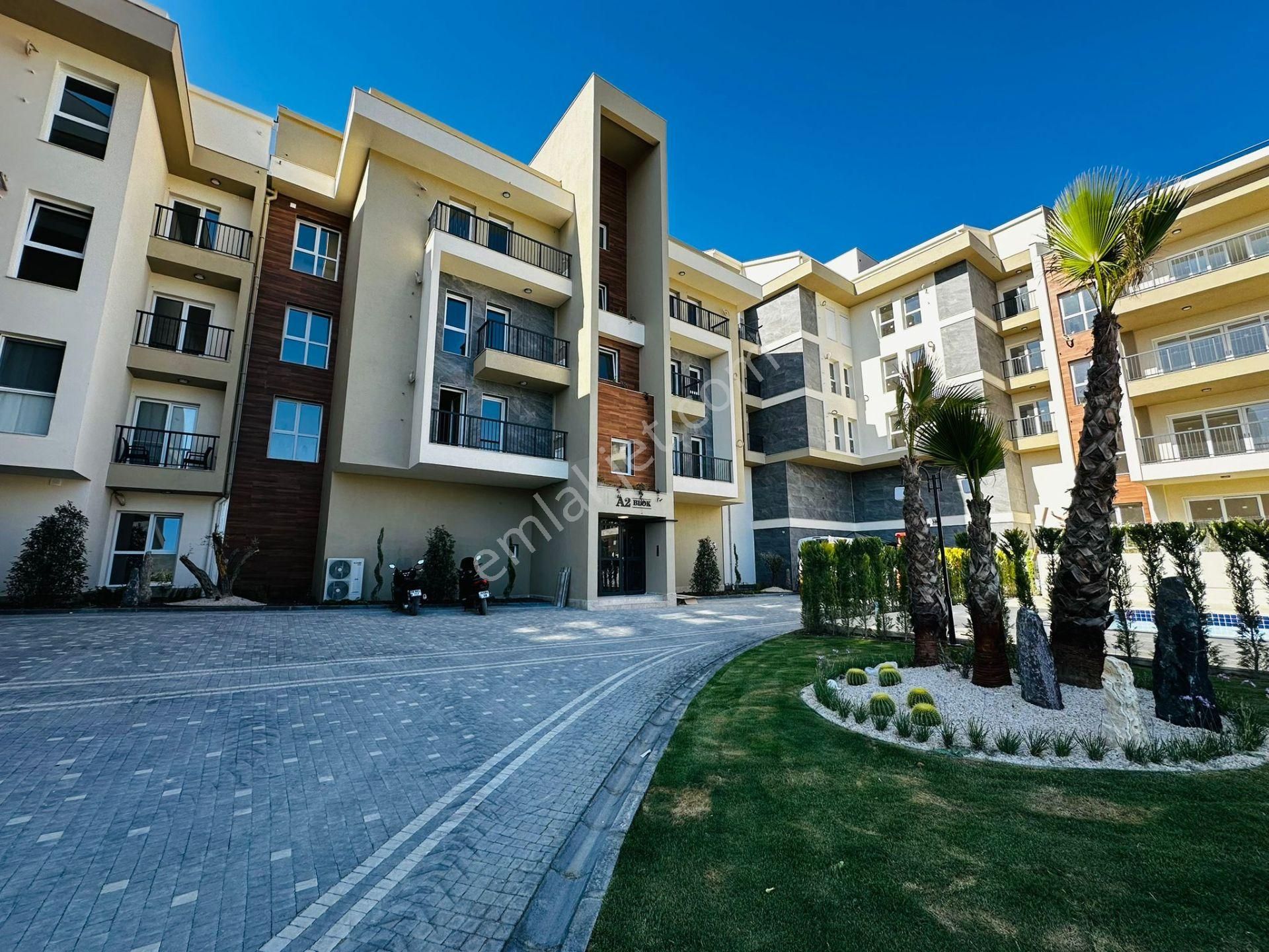 Kuşadası Ege Satılık Residence KUŞADASINDA SATILIK-7/24 GÜVENLİK-HAVUZ-OTOPARK-YERDEN ISITMA-80 M2 ÖZEL BAHÇE-ULTRA LÜX-AKILLI EV