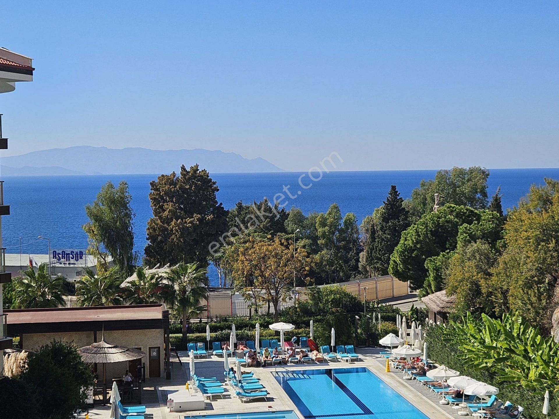 Kuşadası Türkmen Satılık Daire  KUŞADASI RAMADA REZİDANS'TA SATILIK DENİZ MANZARALI 2+1