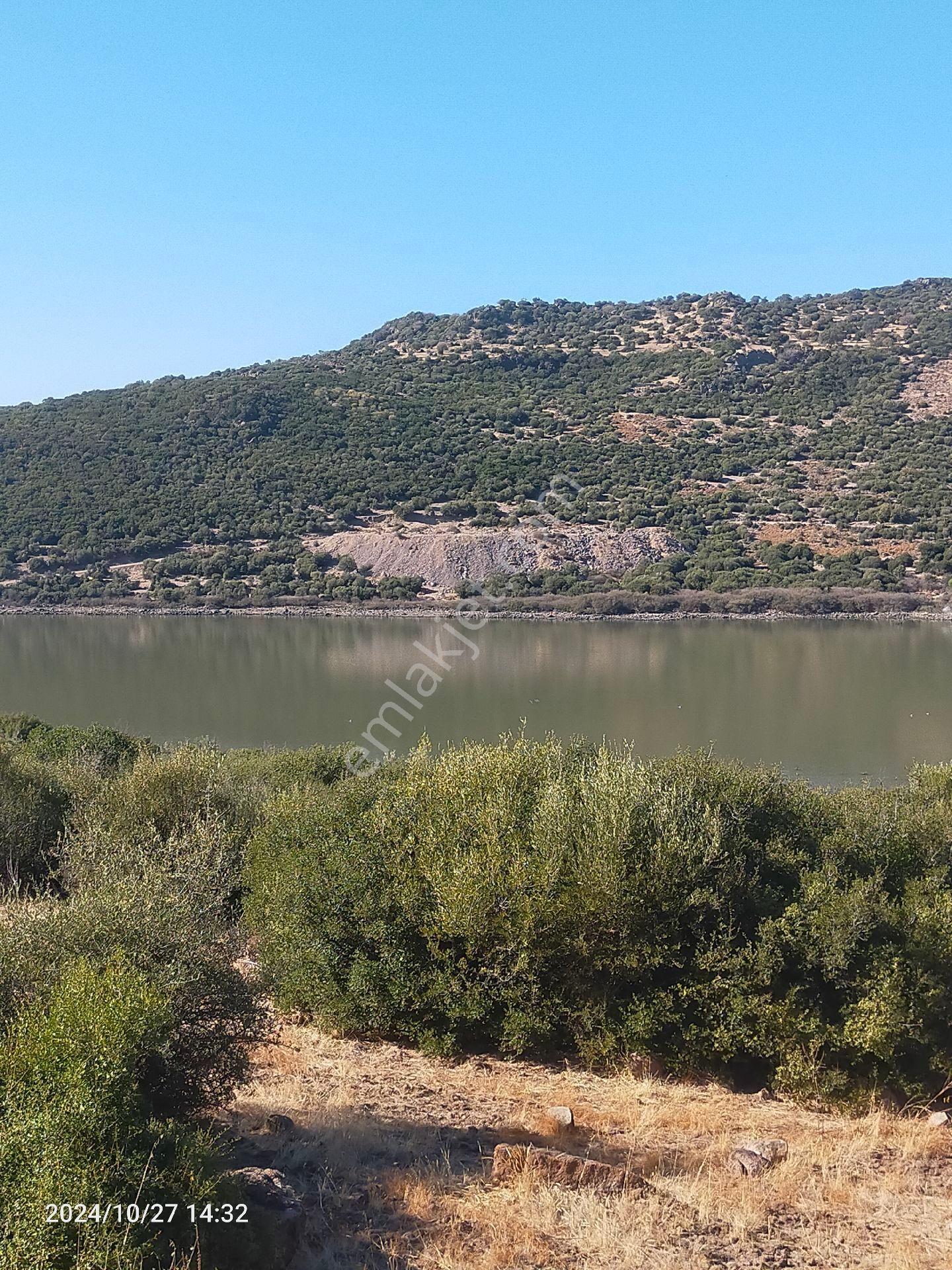 Saadet Korkmaz Emlak'tan Dikili Katıralanı Köyünde 23 Dönüm Baraja 100 Mt Satılık 23 Dönüm Tarla