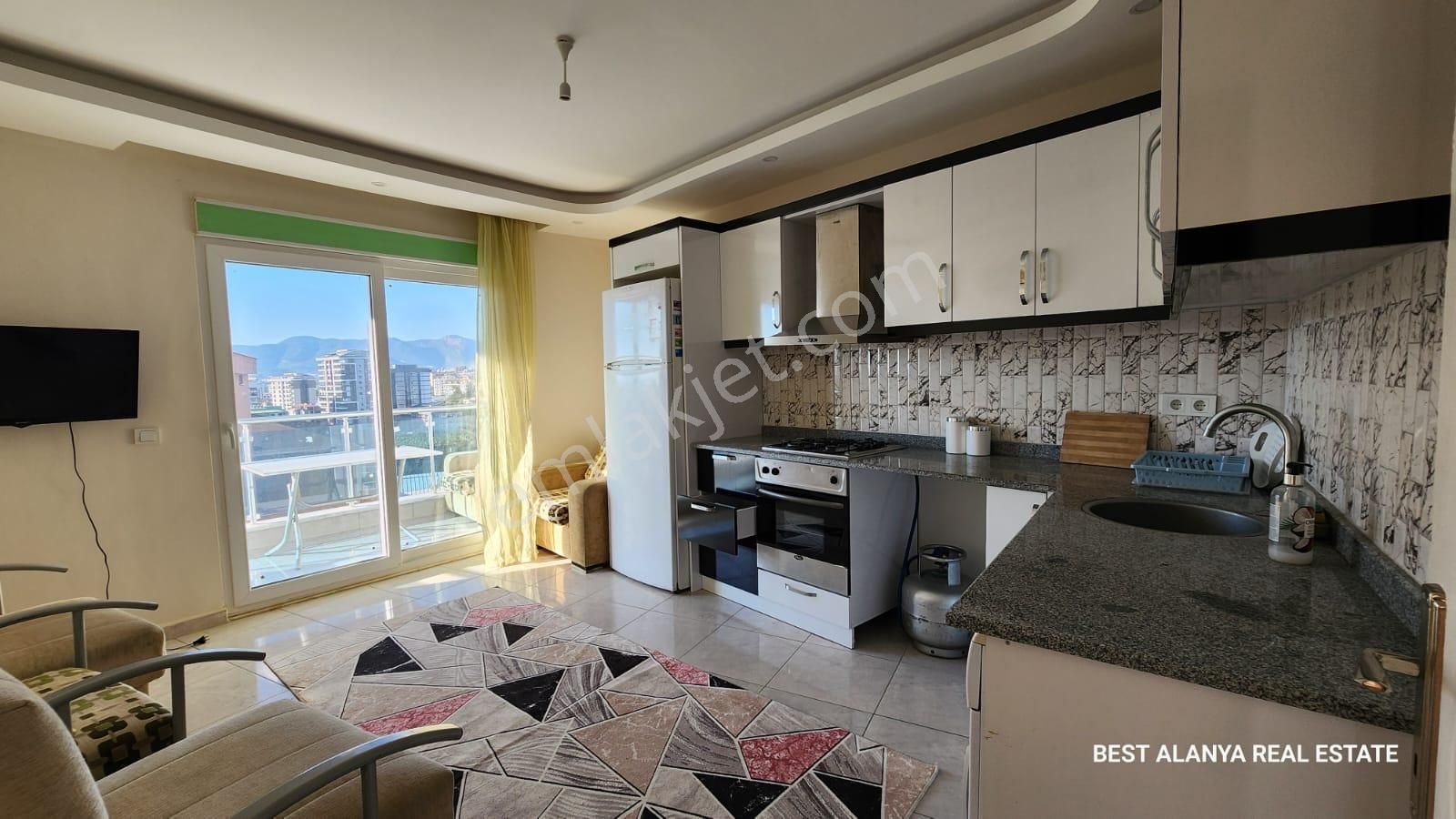 Alanya Mahmutlar Kiralık Daire  1239- ACİL! 50. YIL İLK ÖĞRETİM OKULU YANINDA 1+1 EŞYALI KİRALIK DAİRE 10,000 TL