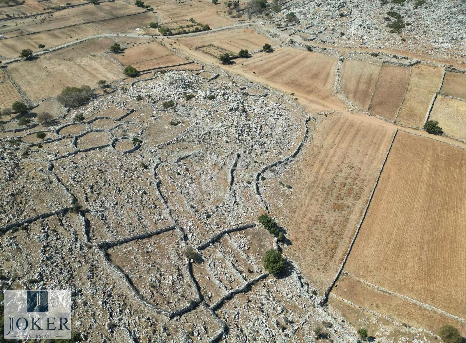 Marmaris Taşlıca Satılık Tarla Joker: Marmaris Taşlıca Yola 120 Metre Cepheli Düzlük Tarla