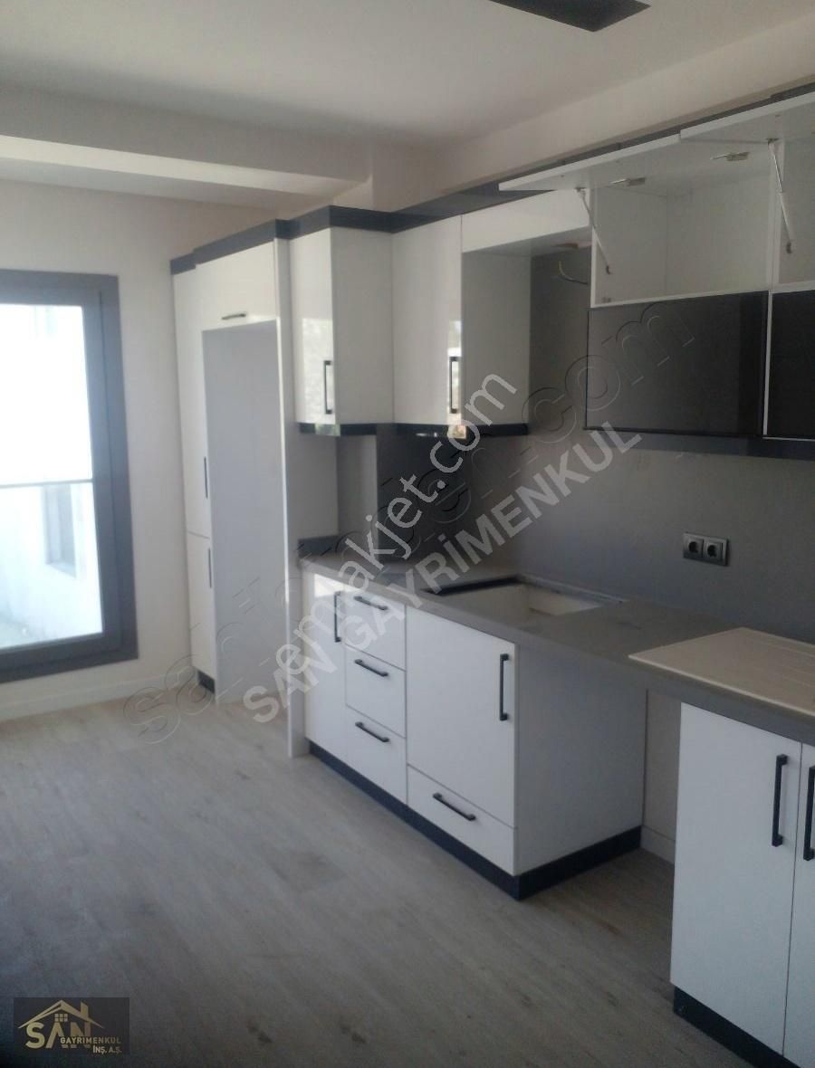 Urla Sıra Satılık Daire URLA MERKEZDE AYRI MUTFAKLI DENİZ MANZARALI SATILIK 2+1 DAİRE