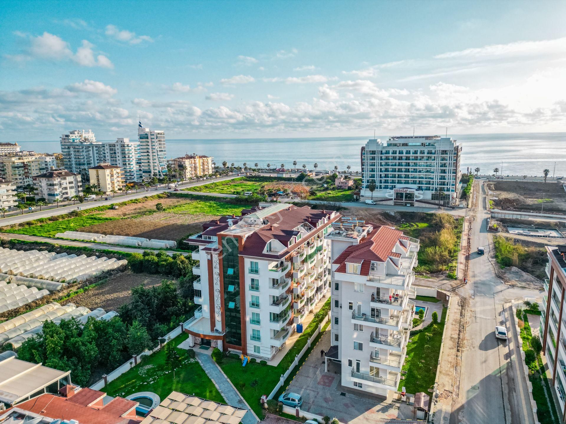 Alanya Kestel Satılık Daire  ALANYA KESTEL 1+1 65M2 EŞYALI DENİZE 250M AKTİVİTELİ SİTE İÇİ