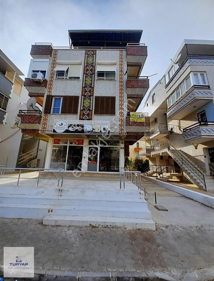 Didim Çamlık Satılık Daire DİDİM ÇAMLIK CADDE ÜZERİNDE SATILIK 1+1 GENİŞ AYRI MUTFAK DAİRE