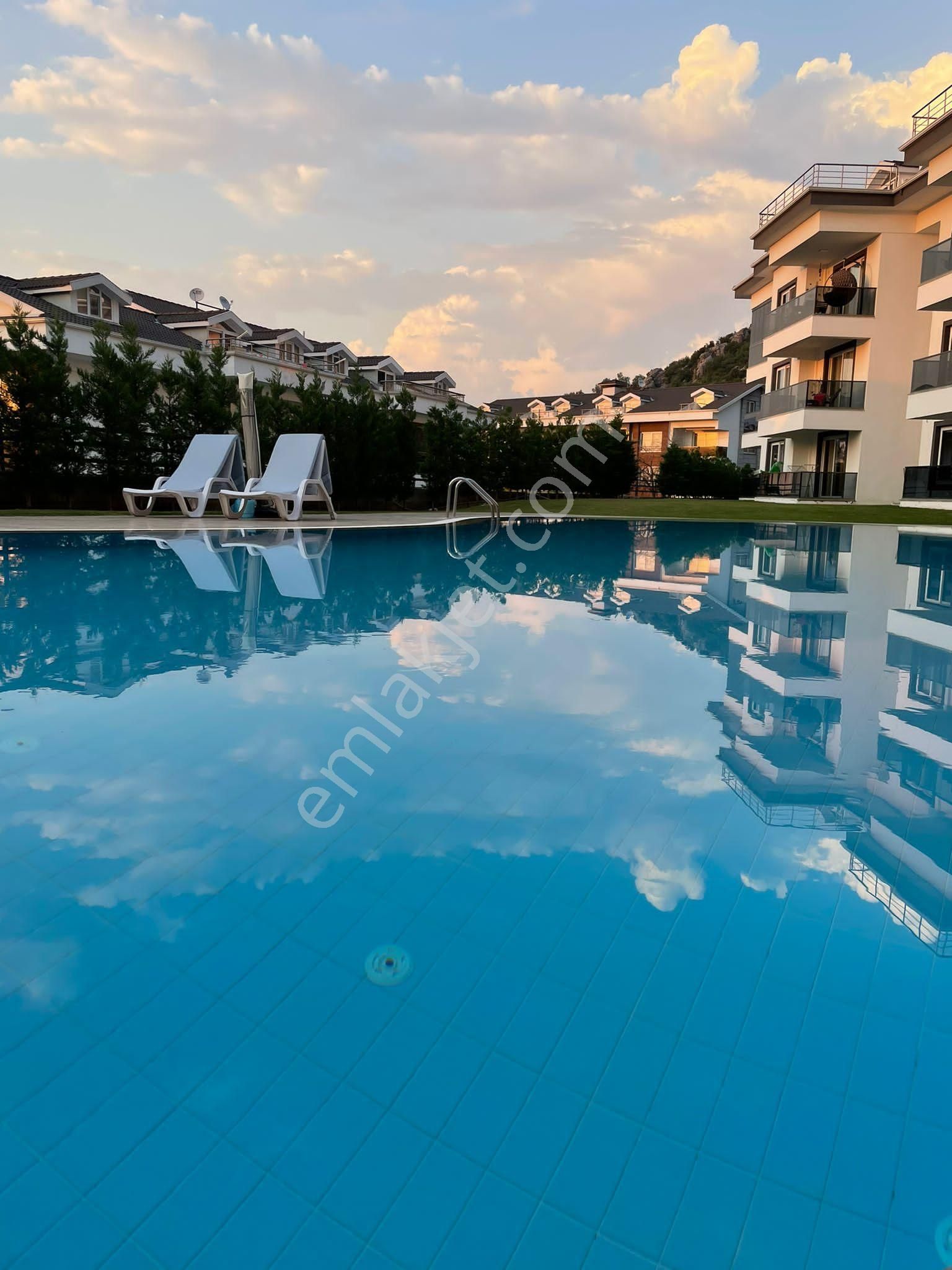 Fethiye Patlangıç Satılık Daire  Yerden Isıtmalı Havuzlu Ful Eşyalı 2+1 Giriş Kat Daire/RU-EN