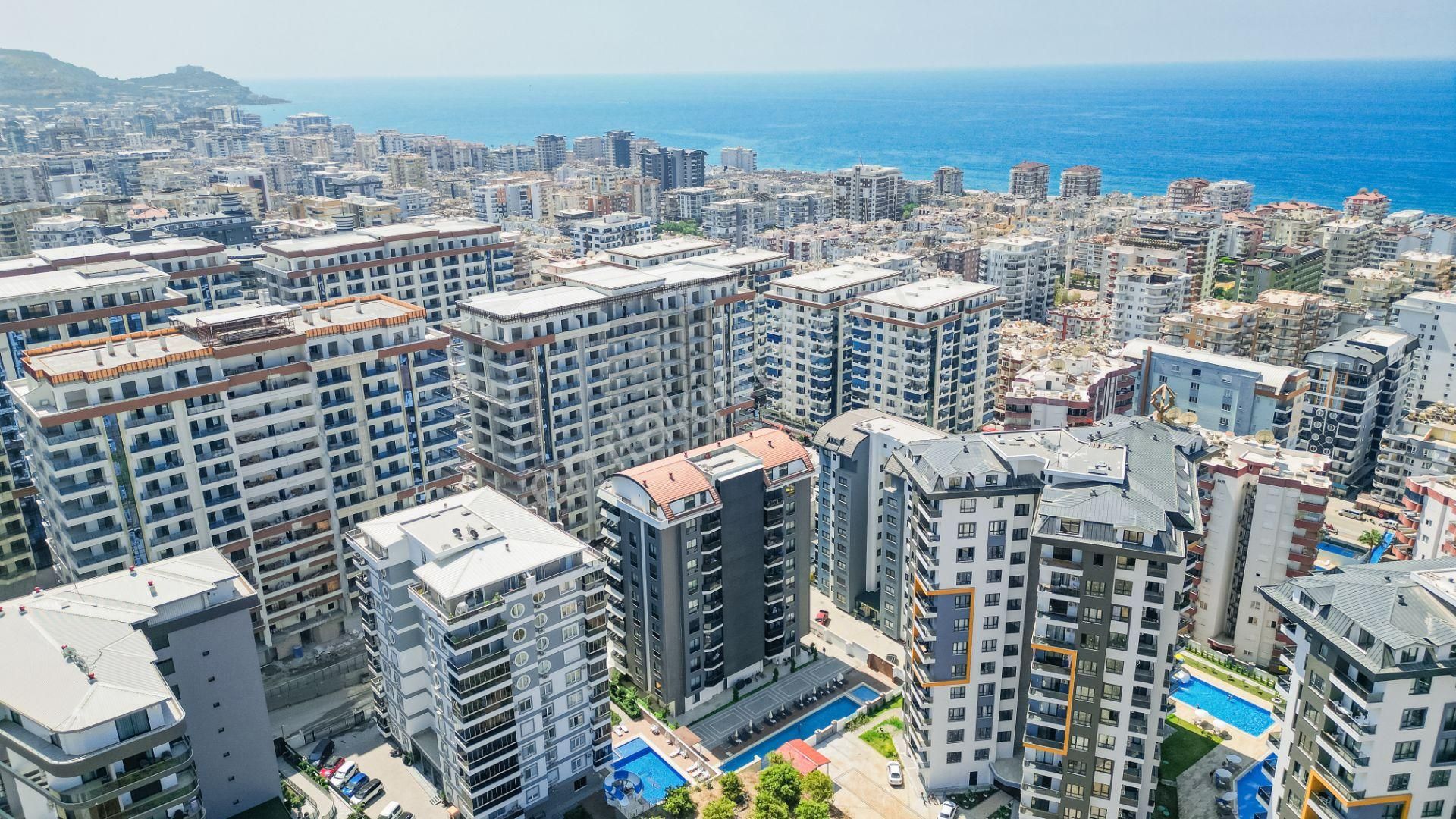 Alanya Mahmutlar Satılık Daire  ALANYA MAHMUTLAR 1+1 53M2 AKTİVİTELİ SİTE İÇİ DENİZE 550M DAİRE