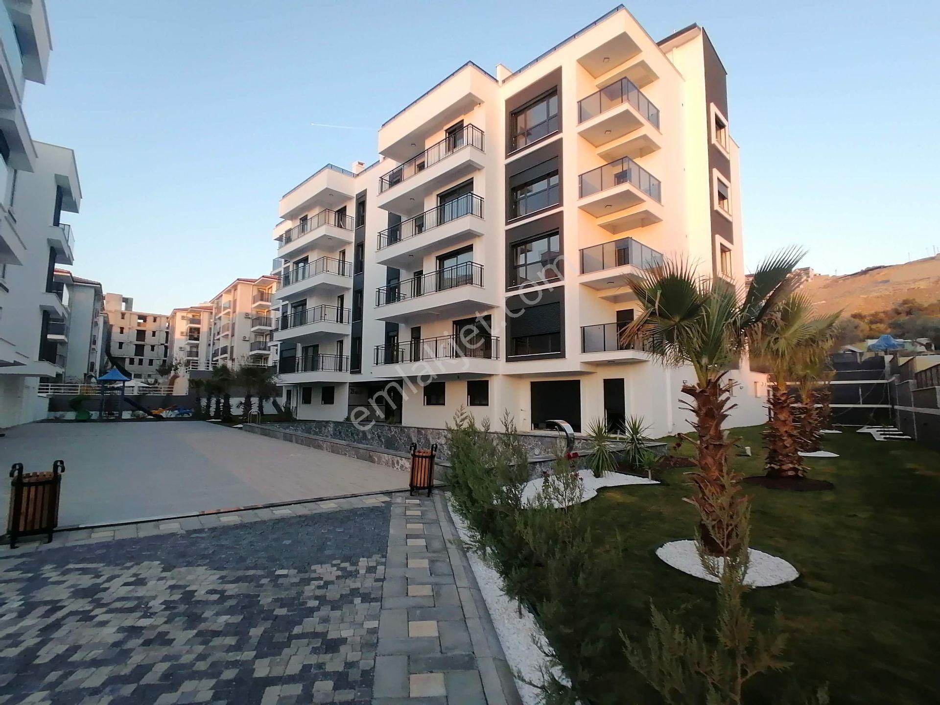 Kuşadası Değirmendere Satılık Daire  DEĞİRMENDERE YERDEN ISITMALI HAVUZLU SİTEDE SIFIR DAİRE FIRSATI