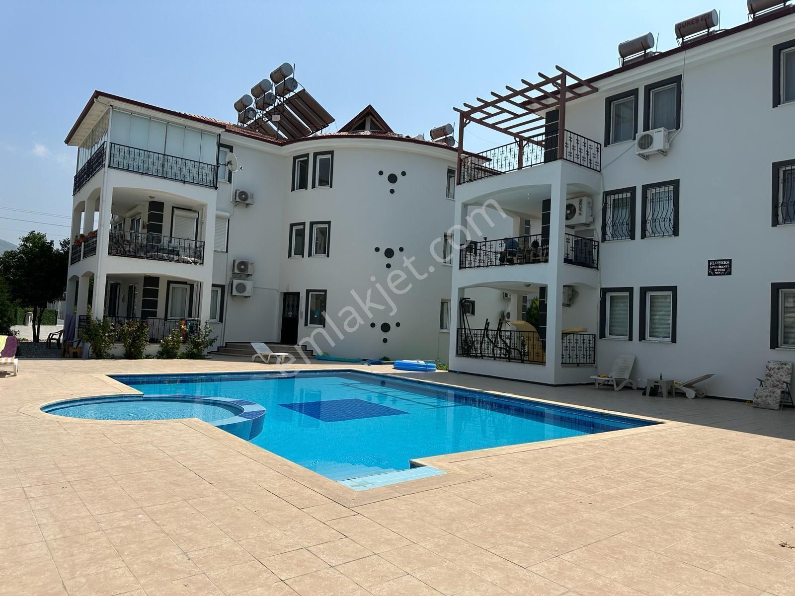 Dalaman Söğütlüyurt Satılık Daire  MUĞLA DALAMAN SÖĞÜRTLÜYURT MAHALLESİNDE 2+1 HAVUZLU SATILIK DAİRE