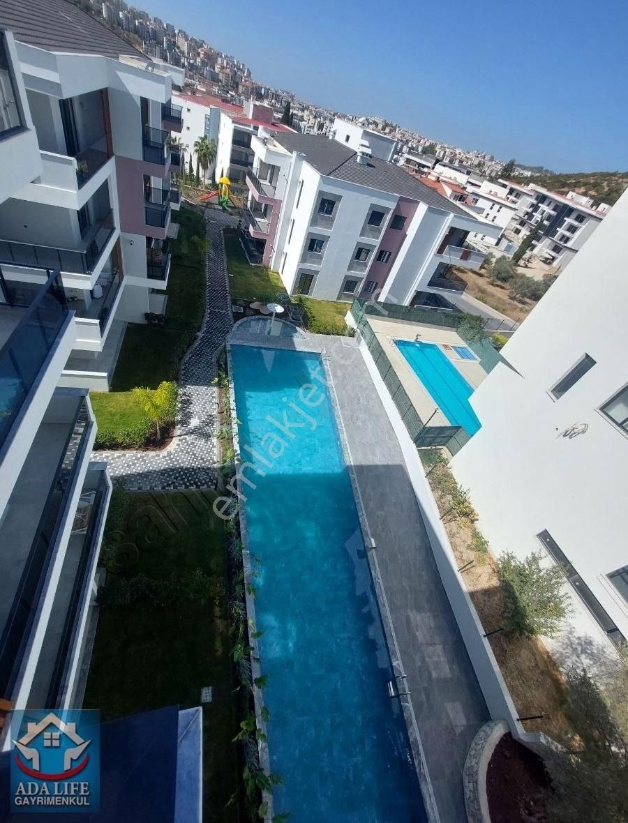 Kuşadası İkiçeşmelik Satılık Daire MERKEZDE ULTRA LUX HAVUZLU SİTE İÇERİSİNDE 2+1 DAİRE